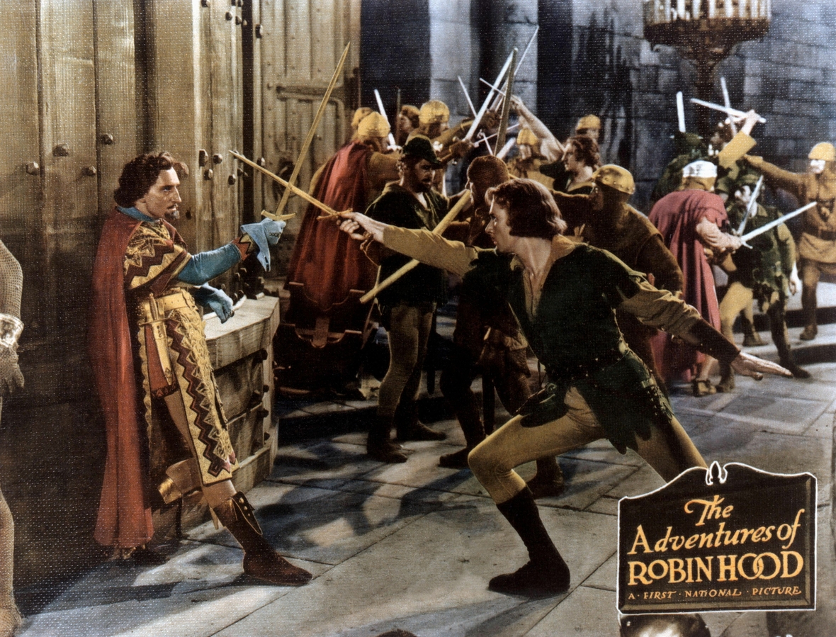 Die Geschichte von Robin Hood, dem Rebellen, der auf der Seite der Armen gegen die Herrschenden kämpfte, wurde oft verfilmt. Hier sieht man eine Szene aus einem Film von 1938. 