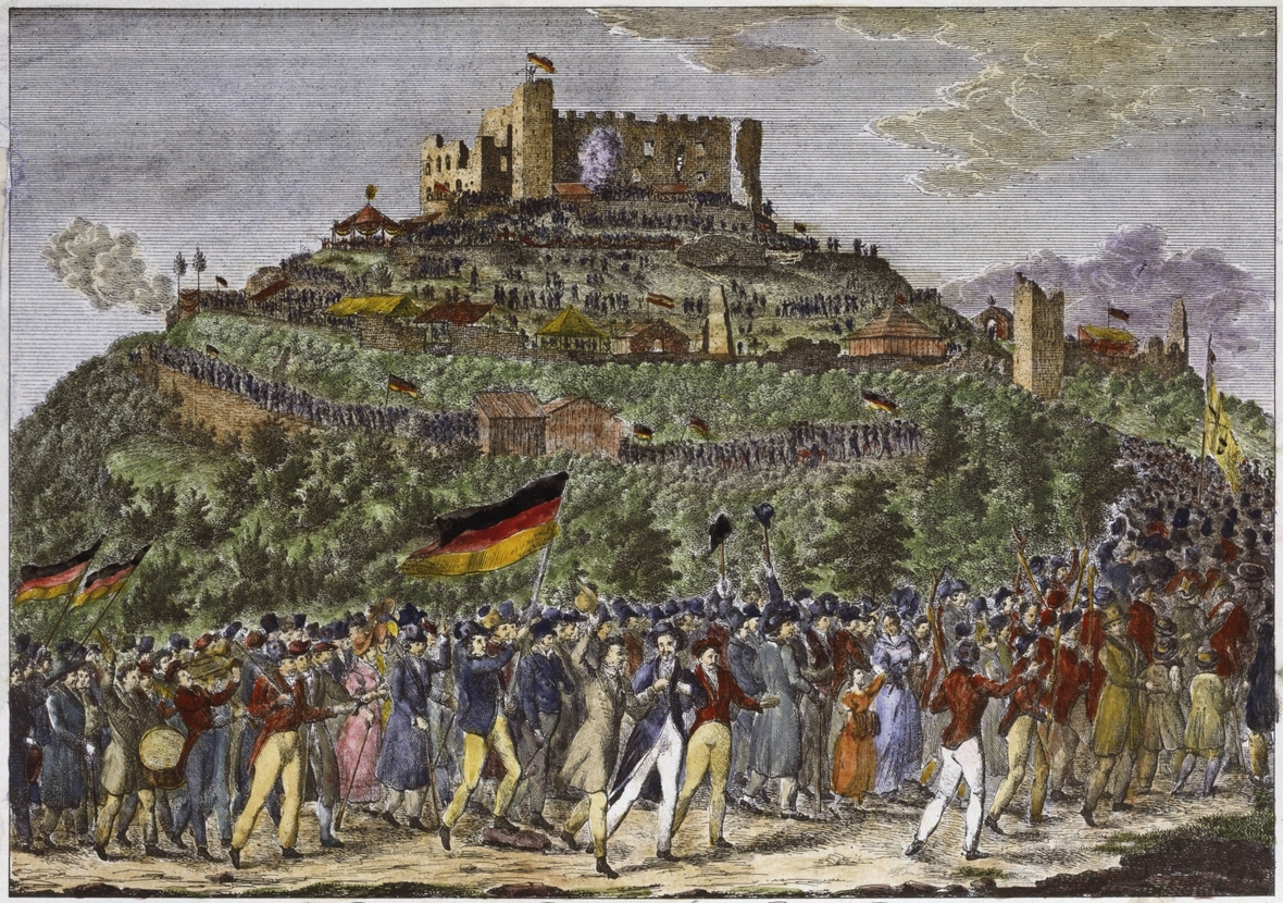 Der Druck zeigt das Hambacher Fest, 27. bis 30. Mai 1832.  Schwarz-rot-goldene Fahnen werden geschwenkt.