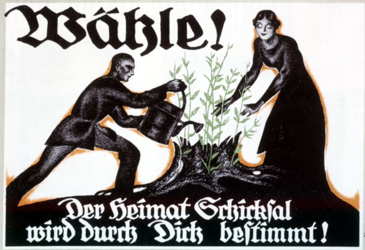 Das Schwarz-Weiß-Foto zeigt ein Plakat aus dem Jahre 1919 mit der Aufschrift: "Wähle! Der Heimat Schicksal wird durch Dich bestimmt!" Mit dem Plakat sollten Frauen erinnert werden, sich an der Wahl zur Deutschen Nationalversammlung 1919. zu beteiligen.