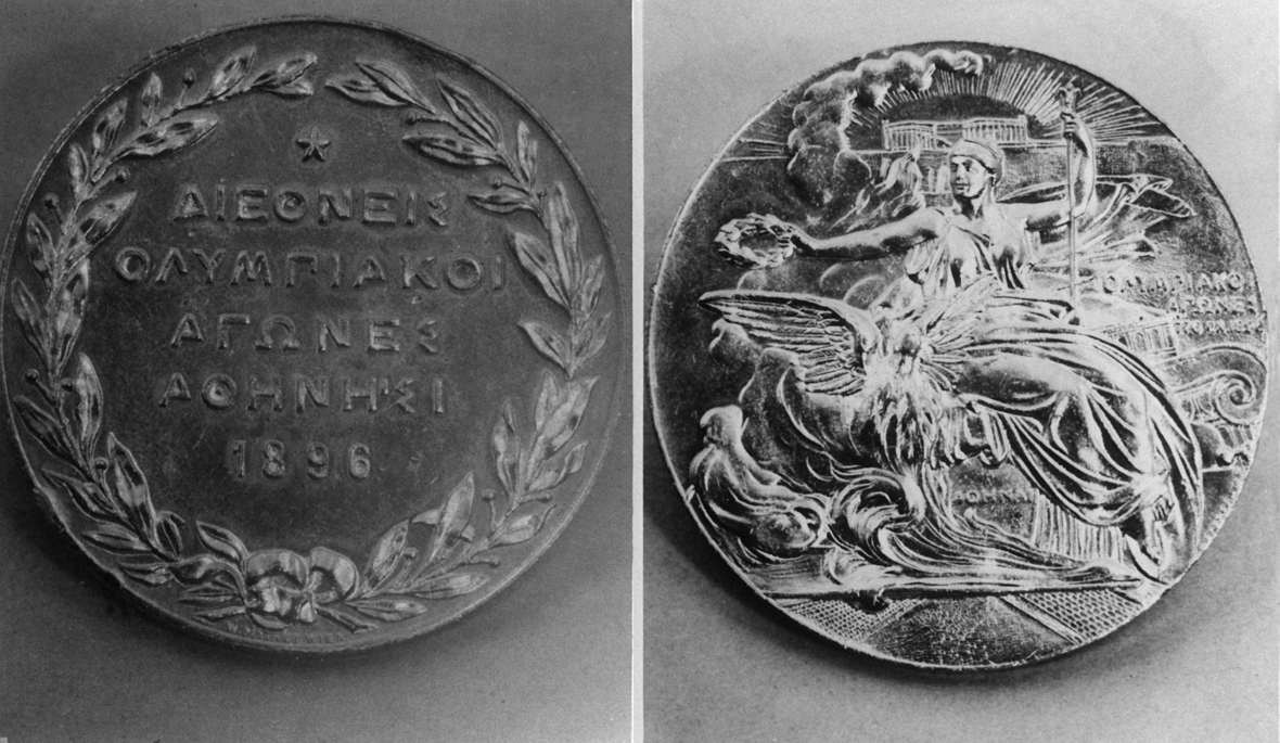 Die Kopie einer Aufnahme aus dem Jahr 1896 zeigt beide Seiten jener Medaillen, mit denen während der 1. Olympischen Spiele der Neuzeit im griechischen Athen die Sieger und Zweitplazierten ausgezeichnet wurden.