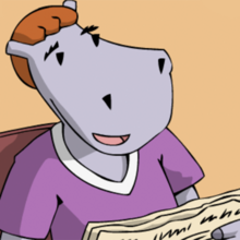 Bärbel Breitfuß sitzt am Schreibtisch.