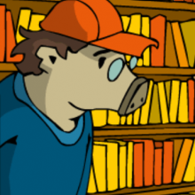 Ein Eber steht vor einem großem Bücherregal.
